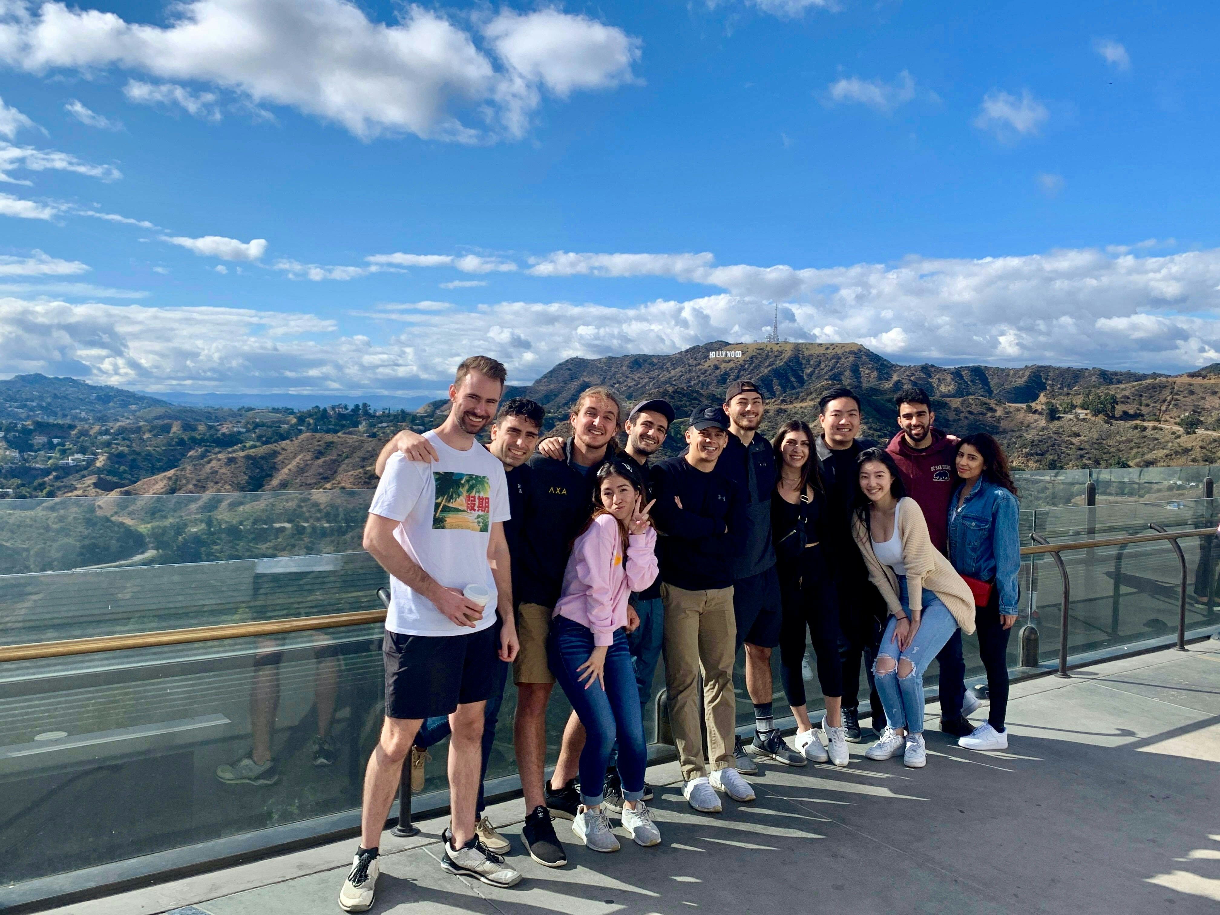 a group of people standing next to each other
